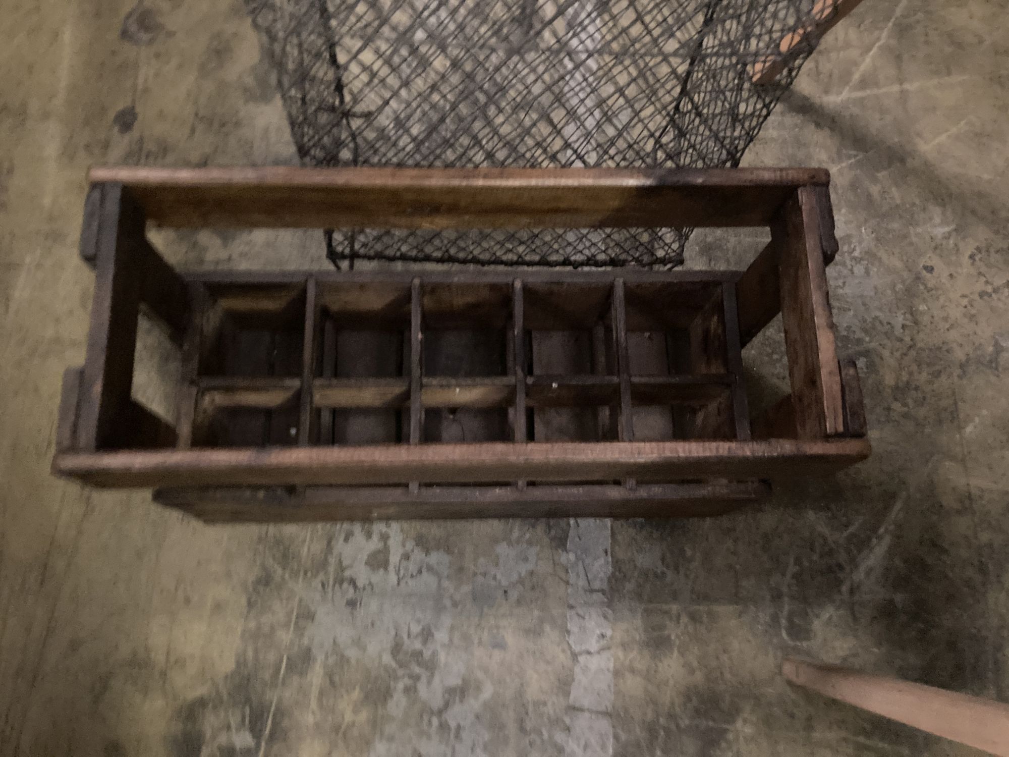 A vintage wood ten division bottle carrier, width 58cm depth 24cm height 37cm, together with a wirework rack